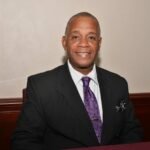 Hon. Eric Evelyn serves as Acting Premier as Hon. Brantley travels on official duty to Panama